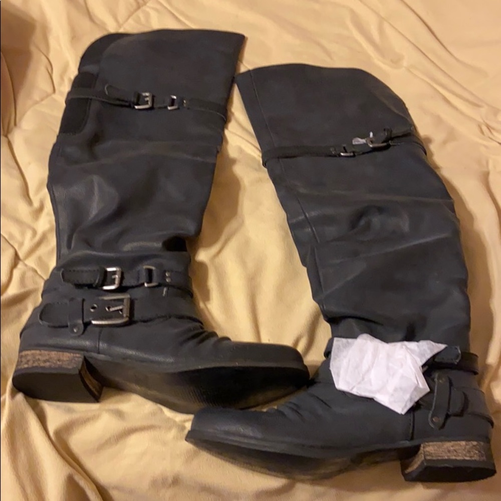 Carlos Santana over the knee boots